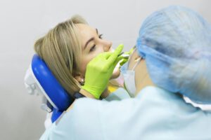 Dental health concept. female mouth on treatment in a dental clinic,